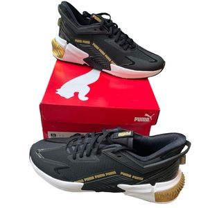 NEW IN BOX Puma Provoke XT FYR Moto Womens Size 10 Black and Puma team Gold
